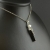 Czarny turmalin (schrol) ze słodkowodną perłą - wisior / Amju Designs / Biżuteria / Wisiory