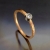 BIZOE, Biżuteria, Pierścionki, Złoty pierścionek z brylantem 0,07 ct SI/H