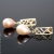 Ażurowe sztyfty z różowymi perłami / Malina Skulska / Biżuteria / Kolczyki