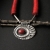 Red Eye - srebrny naszyjnik z koralem / Fiann / Biżuteria / Naszyjniki
