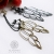 Brass feathers - ażurowe kolczyki-piórka ze srebra i mosiądzu / Alabama Studio / Biżuteria / Kolczyki