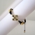Nina Rossi Jewelry, Biżuteria, Bransolety, Cross braided bracelet