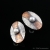 Srebrne kolczyki sztyfty z perłą - owalne ID: DC k 60 / Danka Czapnik / Biżuteria / Kolczyki