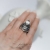 TAYLOR - szeroki srebrny postarzany pierścień z Kryształem górskim i białym Topazem / PASIÓN / Biżuteria / Pierścionki