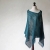 Knitwear Factory: Poncho z surowego lnu: http://www.trendymania.pl/akcesoria-swetry-i-poncza-knitwear-factory,65531.html