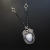 Szelest zimy - srebrny naszyjnik z opalem dendrytowym, perłą i szafirami