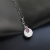 Kornelia Sus, Biżuteria, Wisiory, Sekretne wrota - srebrny dwustronny wisior z turmalinem i perłą