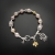 Kornelia Sus, Biżuteria, Bransolety, Zimowy świt - srebrna bransoletka z perłami i motywem kwiatowym