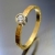 Złoty pierścionek z brylantem 0,08 ct (młotkowana powierzchnia)