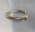 Nierozerwalnie połączone obrączki - podwójny złoty pierścionek z brylantem / BIZOE / Biżuteria / Pierścionki