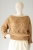 Damski beżowy sweter ozdobiony aplikacją, gotowy do wysyłki / Knitwear Factory / Moda / Swetry i poncza