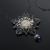 Księżycowy kwiat - ażurowy wisiorek ze srebra / Sztuk Kilka / Biżuteria / Wisiory