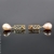 Malina Skulska, Biżuteria, Kolczyki, Ażurowe sztyfty z różowymi perłami