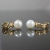 Malina Skulska, Biżuteria, Kolczyki, Nadtopione pozłacane sztyfty z perłami