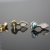 Pozłacane sztyfty z niebieskimi perłami i różowym kwarcem / Malina Skulska / Biżuteria / Kolczyki