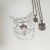 Ziewający kotek mini broszka ze srebra / Cztery Humory / Biżuteria / Broszki