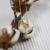 Feniks mini amulet ze złoconego srebra / Cztery Humory / Biżuteria / Wisiory