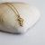 Mini amulet z lecącym smokiem ze złoconego srebra / Cztery Humory / Biżuteria / Wisiory