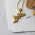 Jeleń mini amulet ze złoconego srebra / Cztery Humory / Biżuteria / Wisiory