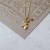 Jeleń mini amulet ze złoconego srebra / Cztery Humory / Biżuteria / Wisiory