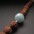 Rudraksha 19 - bransoletka z nasion rudrakszy oraz błękitnego kwarcu / Fiann / Biżuteria / Bransolety