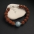 Rudraksha 19 - bransoletka z nasion rudrakszy oraz błękitnego kwarcu / Fiann / Biżuteria / Bransolety