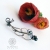 Bronze feather - nausznica z fioletową perłą / Alabama Studio / Biżuteria / Kolczyki