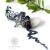 Gloriosa superba - ear cuff - srebrna nausznica z granatami / Alabama Studio / Biżuteria / Kolczyki