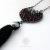 Garnet carnival - srebrny wisior wire wrapping z granatami i czarnym chwostem