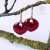 Ruby - kolczyki wire wrapping z rubinową emalią / Alabama Studio / Biżuteria / Kolczyki