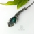 Kalia z zielonym onyksem - srebrny wisior z motywem kwiatowym