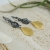 Little treasures - smukłe kolczyki srebrne ze złotymi muszelkami / Alabama Studio / Biżuteria / Kolczyki