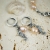 Perłowy przypływ - asymetryczna srebrna bransoleta z brzoskwiniowymi perłami / Alabama Studio / Biżuteria / Bransolety