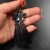 Gwiazdy hematite, kolczyki z chwostami i kryształami Swarovskiego, beading / Sol / Biżuteria / Kolczyki