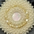 Renda, medalion z masą perłową, haft koralikowy / Sol / Biżuteria / Wisiory