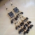 Dazzling black chandeliers / Nina Rossi Jewelry / Biżuteria / Kolczyki