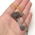 Centranthus - unikatowy wisior w kształcie klucza wykonany ze srebra i granatu / Iza Malczyk / Biżuteria / Naszyjniki