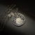Iza Malczyk, Biżuteria, Naszyjniki, Perigeum - bajkowy naszyjnik z wisiorem przedstawiającym księżyc w pełni, wykonany ze srebra i kamieni księżycowych