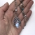 Khione - unikatowy srebrny naszyjnik z kamieniem księżycowym, kianitem, turkusem i perłą / Iza Malczyk / Biżuteria / Naszyjniki