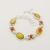 AmberGallery, Biżuteria, Bransolety, Srebrna bransoletka z bursztynem, perłami i koralem ID: 220424
