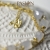 SWAN - złocona bransoletka z łabędziem ozdobiona Chalcedonami i Topazami Swiss Blue / PASIÓN / Biżuteria / Bransolety