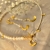 OVER THE MOUNTAINS - krótki złocony srebrny naszyjnik z perłami, księżycem i gwiazdkami / PASIÓN / Biżuteria / Naszyjniki