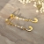 OVER THE MOUNTAINS - długie złocone srebrne kolczyki na sztyftach z księżycem i perłami / PASIÓN / Biżuteria / Kolczyki