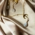 ON THE MOON - minimalistyczny złocony naszyjnik z kamieniem księżycowym, perłami i księżycem / PASIÓN / Biżuteria / Naszyjniki
