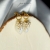 FULL MOON - krótkie złocone srebrne kolczyki z kamieniem księżycowym i kaskadą pereł / PASIÓN / Biżuteria / Kolczyki