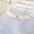 HALF MOON - bransoletka ze złoconego srebra z kamieniami księżycowymi i półksiężycami / PASIÓN / Biżuteria / Bransolety