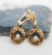 Kolczyki srebrne pozłocone z perłą z kolekcji Europa / Points of View Anna Kamińska / Biżuteria / Kolczyki